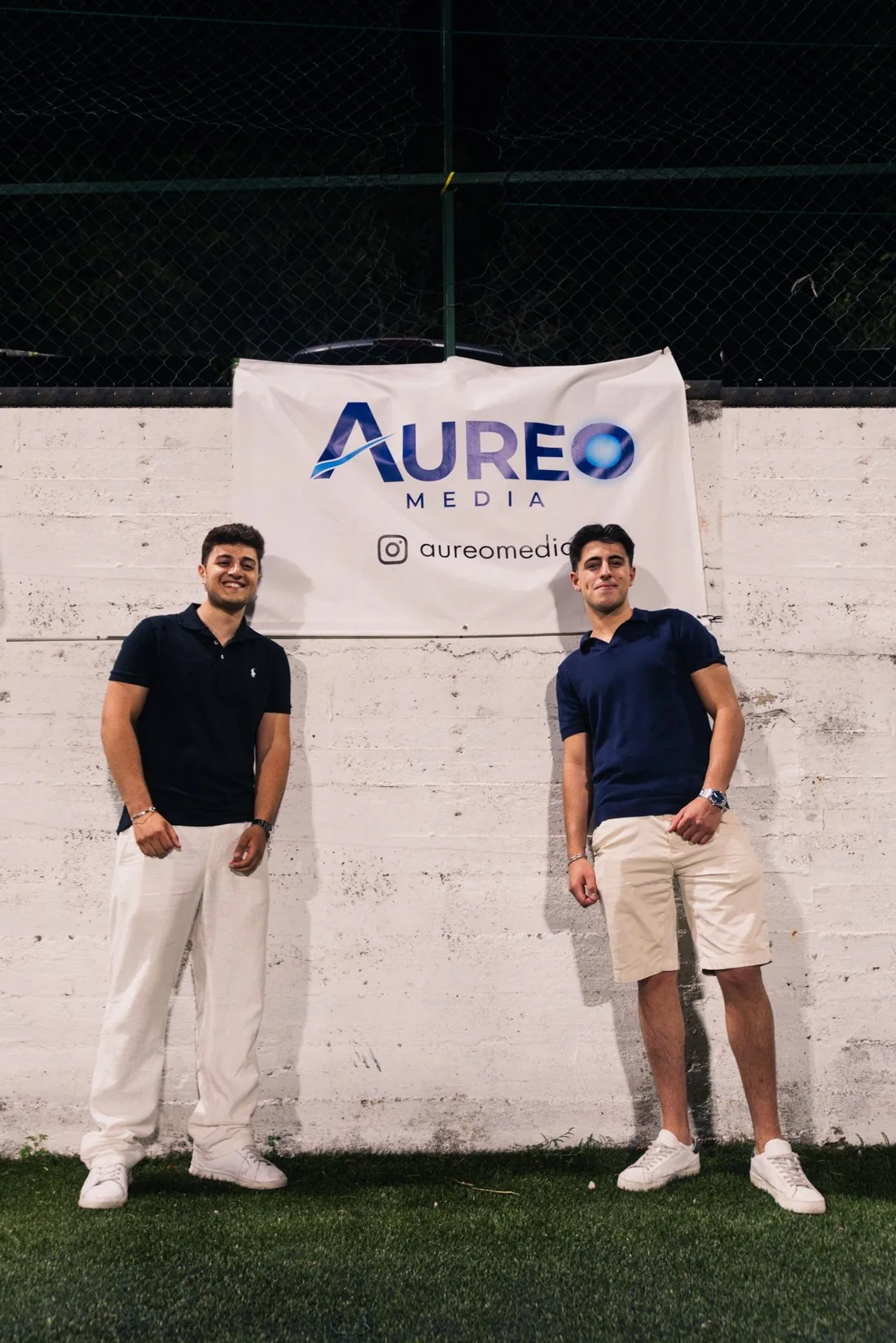 Antonio Ugliano e Carmine Petti sotto lo striscione di Aureo Media